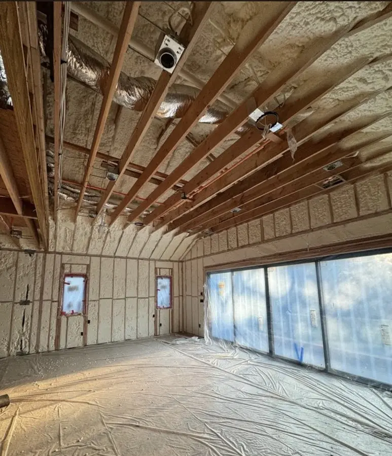Interior walls and ceiling insulated with spray foam during new construction in Williamson